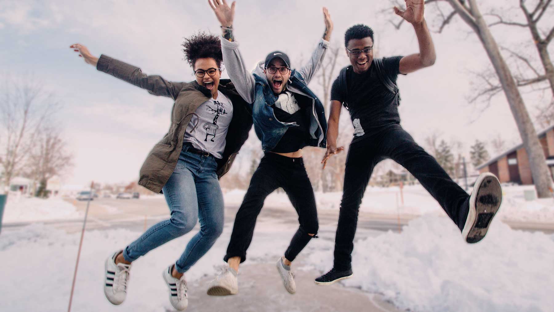 Business owners jumping for joy about their business websites by perk brands